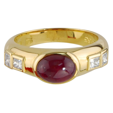 12565 Ruby & Diamond Band Designed and Handmade by Kaufmann de Suisse in 18kt Yellow Gold featuring one Oval Cabochon cut Ruby weighing 1.88cts and 4 FVVS Quality Princess Cut Diamonds weighing a