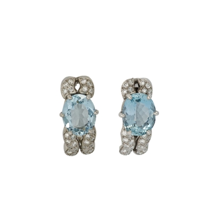 17304 Double Flowing Lines Aquamarine & Diamond Clip On Huggie Earrings Designed and Handmade by Kaufmann de Suisse in 18kt White Gold featuring 2 Oval Cut Aquamarines weighing a total of 4.53cts