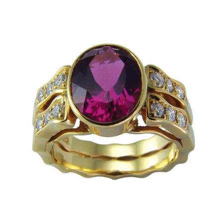 17626 Double Flowing Lines Pink Tourmaline and Diamond Ring Designed & Handmade by Kaufmann de Suisse in 18kt Yellow Gold featuring 1 Oval Pink Tourmaline weighing