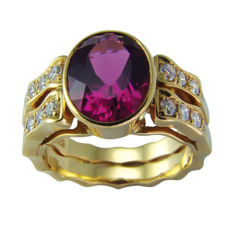 17626 Double Flowing Lines Pink Tourmaline and Diamond Ring Designed & Handmade by Kaufmann de Suisse in 18kt Yellow Gold featuring 1 Oval Pink Tourmaline weighing 2.44cts mounted with 18 RTound B