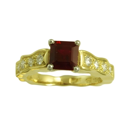 18549 Single Flowing Lines Ruby & Diamond Ring Designed & Handmade by Kaufmann de Suisse in 18kt Yellow Gold & Platinum featuring 1 Emerald cut No Heat Ruby weighing 1.20cts mounted with 8 Round B