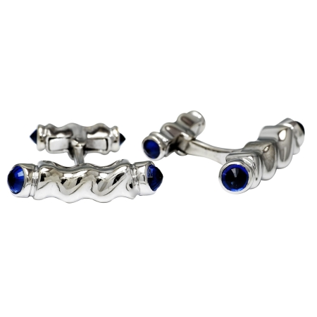 18792 Flowing Lines Blue Sapphire Cufflinks Designed and Handmade by Kaufmann de Suisse in 18kt White Gold featuring 8 Round Blue Sapphires weighing a total of 3.99cts.