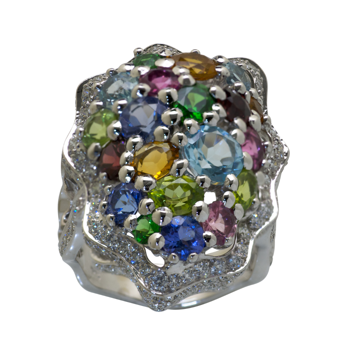 19920 Flowing Lines Multi Stone Wave Ring Designed and Handmade by Kaufmann de Suisse in 18kt White Gold featuring 2 Rhodolite Garnets, 3 Peridots, 3 Tanzanites, 3 Aquamarines, 3 Citrines, 3 Tsavo
