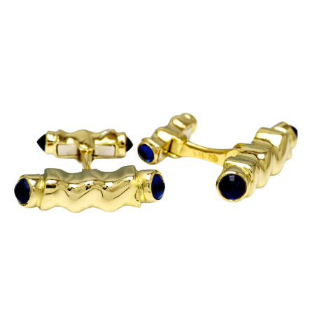 22211 Flowing Lines Blue Sapphire Cufflinks Designed & Handmade by Kaufmann de Suisse in 18kt Yellow Gold featuring 4 Round Blue Sapphires weighing a total of 2.62cts and 4 Round Blue Sapphires we