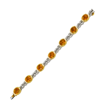 17121 Flowing Lines Citrine Bracelet Designed & Handmade by Kaufmann de Suisse in 18kt Yellow & White Gold featuring 7 Oval Cut Citrines weighing a total of 17.41cts