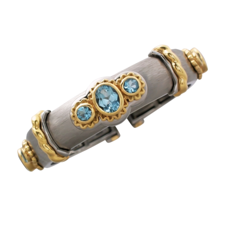 17534 Wide Aquamarine Callista Bangle Designed & Handmade by Kaufmann de Suisse in Stainless Steel and 18kt Yellow Gold featuring 3 Oval Aquamarines weighing a total of 5.11cts and 6 Round Aquamar