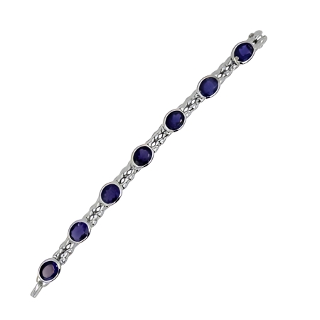 17571 Flowing Lines Iolite Link Bracelet Designed & Handmade by Kaufmann de Suisse in 18kt White Gold featuring 17 Oval Cut Iolites weighing a total of 19.11cts