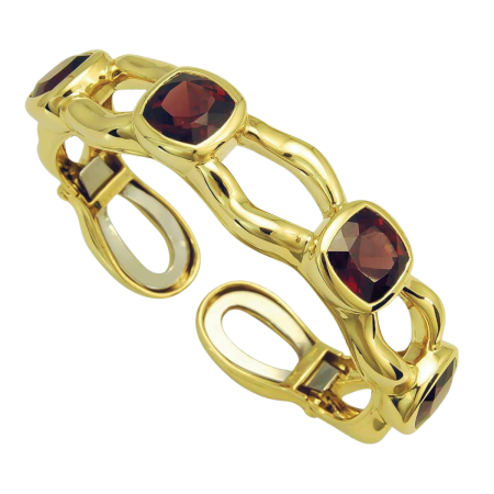 18939 Tsarina Rhodolite Clip Bangle Designed & Handmade by Kaufmann de Suisse in 18kt Yellow Gold featuring 4 Cushion cut Rhodolite Garnets weighing a total of 21.04cts