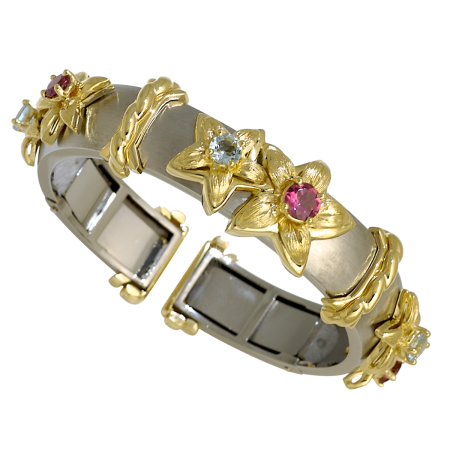 19345 Jasmin de Nuit Callista Clip Bangle Designed & Handmade by Kaufmann de Suisse in 18kt Yellow Gold & Stainless Steel featuring 3 Pink Tourmalines weighing a total of 1.63cts and 3 Aquamarines