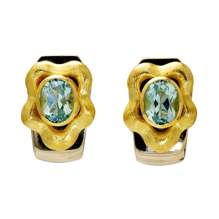 20962 Callista Clip Blue Topaz Earclips Designed & Handmade by Kaufmann de Suisse in Stainless Steel and 18kt Yellow Gold featuring 2 Oval Blue Topaz weighing a total of 3.30cts