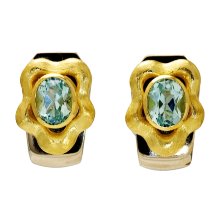 20962 Callista Clip Blue Topaz Earclips Designed & Handmade by Kaufmann de Suisse in Stainless Steel and 18kt Yellow Gold featuring 2 Oval Blue Topaz weighing a total of 3.30cts