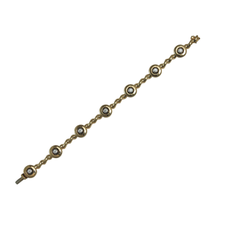 21285 Flowing Lines Diamond Bracelet Designed and Handmade by Kaufmann de Suisse in 18kt Yellow Gold featuring 7 Round Brilliant Cut GVS Quality Diamonds weighing a total of 1.28cts