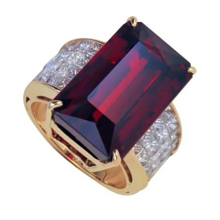 23279 Rhodolite and Diamond Ring Designed & Handmade by Kaufmann de Suisse in 18kt Yellow Gold featuring 1 AAA Quality Emerald Cut Rhodolite Garnet flanked by 48 Princess Cut GVS Quality Diamonds