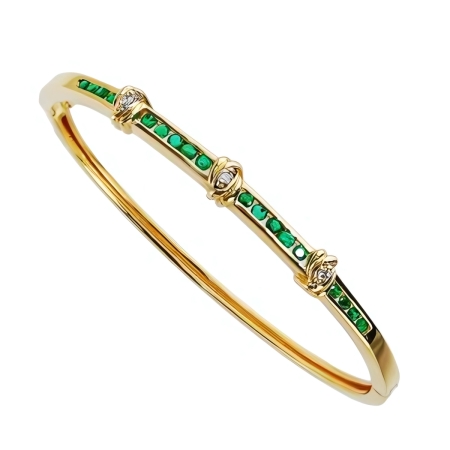 23451 Emerald and Diamond Bangle Bracelet, Handmade in 14k Yellow Gold with 18 Round Emeralds Weighing .90 Carats Total and 3 Round Diamonds Weighing .03 Carats Total