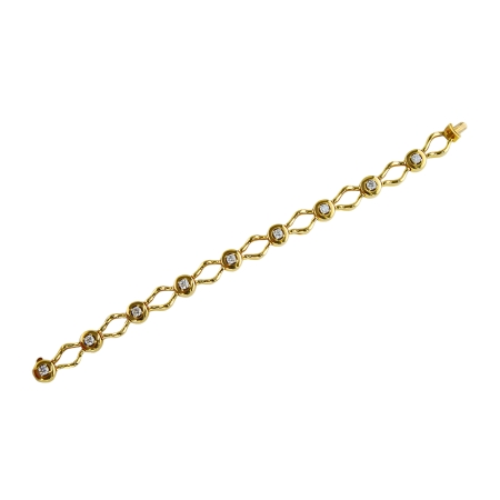 30776 Open Flowing Lines Diamond Bracelet Designed and Handmade by Kaufmann de Suisse in 18kt Yellow Gold featuring 9 Round Brilliant cut GVS Quality Diamonds weighing a total of 1.61cts.