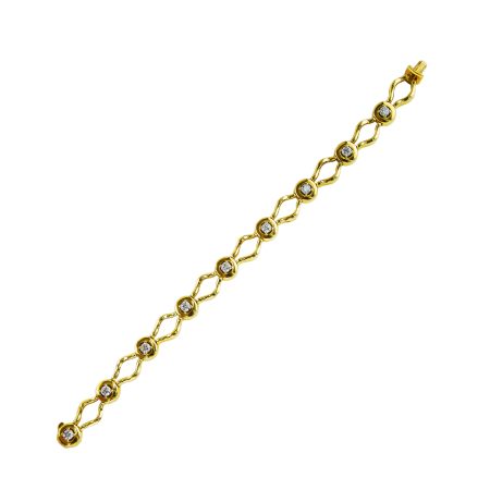 30776 Open Flowing Lines Diamond Bracelet Designed and Handmade by Kaufmann de Suisse in 18kt Yellow Gold featuring 9 Round Brilliant cut GVS Quality Diamonds weighing a total of 1.61cts.