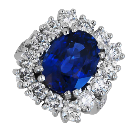 40035 Classic Sapphire & Diamond Ring Designed and Handmade by Kaufmann de Suisse in Platinum featuring 1 Oval Cut 7.11 cts AGL Certified Blue Sapphire surroun