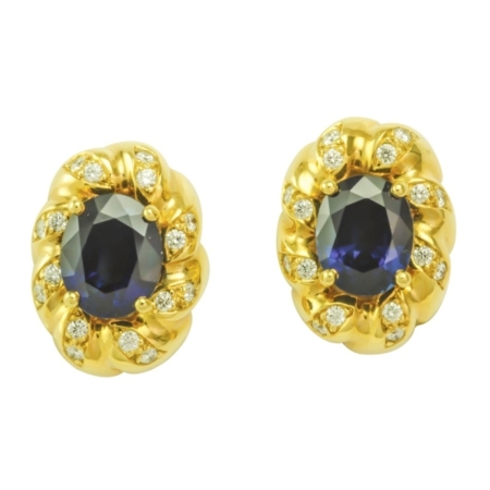 16170-Flowing Lines Sapphire & Diamond Clip On Earrings Designed & Handmade by Kaufmann de Suisse in 18kt Yellow Gold featuring 2 Oval Blue No Heat Sapphires weighing a total of 6.00cts mounted with 32