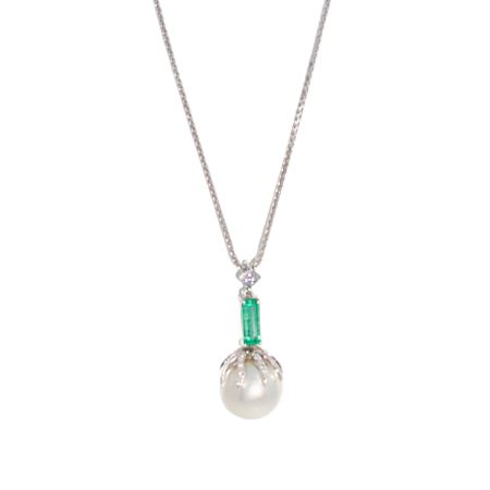 24074 South Sea Pearl Pendant Designed and Handmade in 18kt White Gold featuring one South Sea Pearl measuring 13mm, 1 Emerald Cut Emerald weighing 0.93cts and 64 Round Brilliant cut GSI Quality D