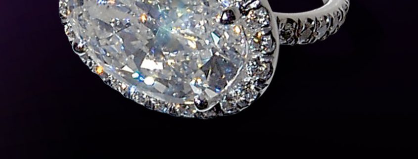 Eye Catching Oval with Pave Diamond Engagement