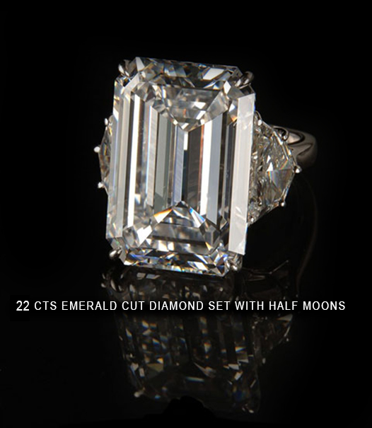 22 carats emerald cut diamond set with half moons