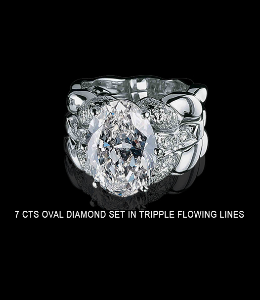 7-CTS-OVAL-DIAMOND-SET-IN-TRIPPLE-FLOWING-LINES 7 carats ring with oval diamond set in triple flowing lines