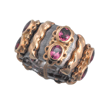 20362 Callista Eternity Ring with Rhodolite Garnets Designed & Handmade by Kaufmann de Suisse in Stainless Steel and 18kt Yellow Gold with 10 Oval Faceted Rhodolite Garnets weighing a total of 4.4