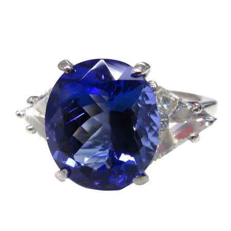 21358 Classic Three Stone Tanzanite & Diamond Ring Designed and Handmade by Kaufmann de Suisse in Platinum featuring one 7.12cts Oval Tanzanite flanked