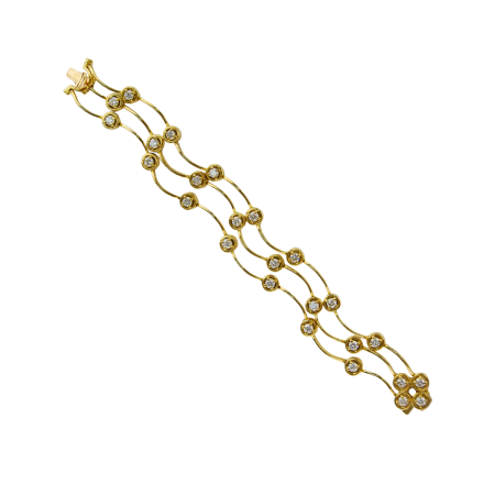 21987 Triple Cascade Diamond Bracelet Designed and Handmade by Kaufmann de Suisse in 18kt Yellow Gold featuring 25 Round Brilliant cut GVS Quality Diamonds weighing a total of 4.01cts.