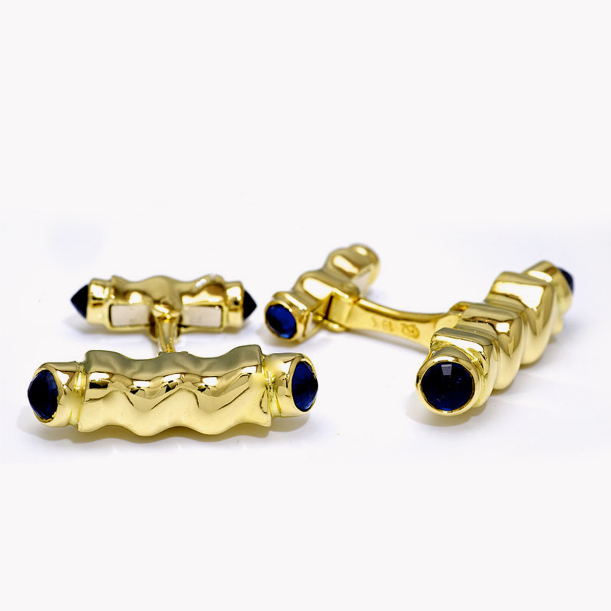 22211-Flowing Lines Blue Sapphire Cufflinks Designed & Handmade by Kaufmann de Suisse in 18kt Yellow Gold featuring 4 Round Blue Sapphires weighing a total of 2.62cts and 4 Round Blue Sapphires weighing a total of 1.25cts