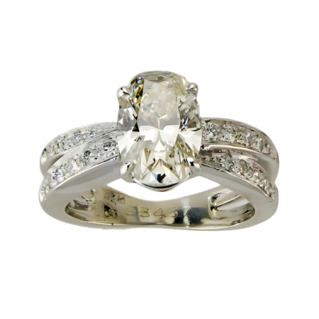 23467 Iolite and Diamond Crossover Ring Designed & Handmade by Kaufmann de Suisse in Platinum featuring 1 Oval Cut 2.15cts Iolite and 22 Round Brilliant Cut GVS Quality Round Diamonds