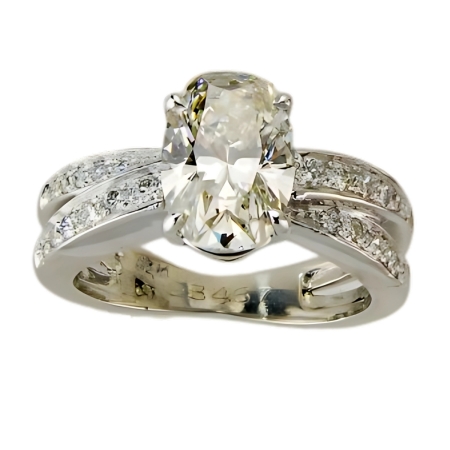 23467 Iolite and Diamond Crossover Ring Designed & Handmade by Kaufmann de Suisse in Platinum featuring 1 Oval Cut 2.15cts Iolite and 22 Round Brilliant Cut GVS Quality Round Diamonds weighing a t