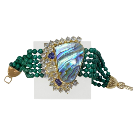 23530 Malachite Bead, Mother of Pearl, Aquamarine and Iolite Bracelet Designed & Handmade by Kaufmann de Suisse in 18kt Yellow Gold featuring one Free Form Mother of Pearl weighing 33.66cts, 6 str