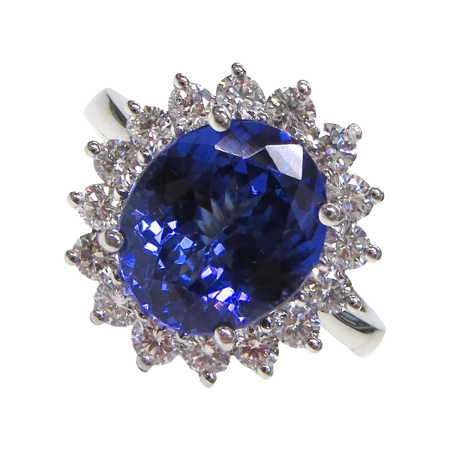 23754 Tanzanite & Diamond Halo Ring Designed & Handmade by Kaufmann de Suisse in 18kt White Gold featuring one 4.02cts Oval Tanzanite surrounded by 16 Round Brilliant Cut GSI Quality Diamonds weig