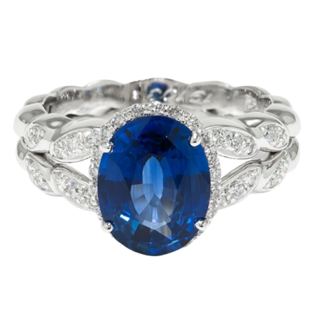 23915 Sapphire & Diamond Halo Ring Designed & Handmade in 18kt White Gold featuring one Oval Blue Sapphire weighing 1.66cts surrounded by 76 Round Brilliant cut GVS Quality Diamonds weighing a tot