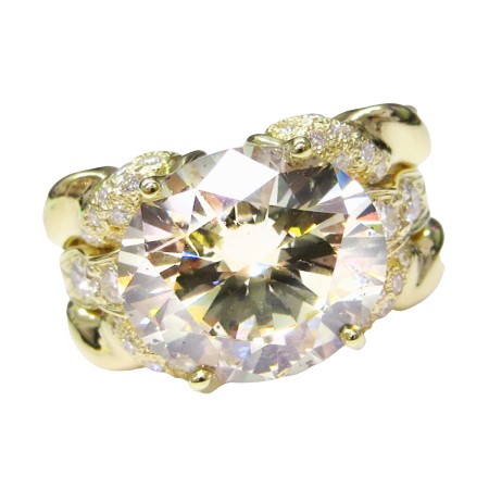 24044 Triple Flowing Lines Diamond Ring Designed & Handmade by Kaufmann de Suisse in 18kt Yellow Gold featuring one 8.05cts LSI2 GIA Certified Round Brilliant Cut Diamond mounted with 38 Round Bri