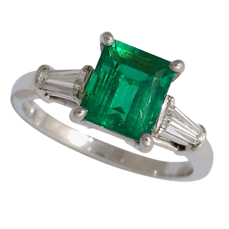 24235 Classic Green Tourmaline & Diamond Ring Designed & Handmade made in 14kt White Gold featuring 1 Emerald Cut Green Tourmaline weighing 8.88cts flanked by two taperred Baguette Diamonds HVS Qu