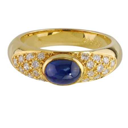 12399 Sapphire & Diamond Band Designed and Handmade by Kaufmann de Suisse in 18kt Yellow Gold featuring one Oval Cabochon cut Sapphire weighing 1.38cts and 20 FVVS Quality Round Diamonds weighing