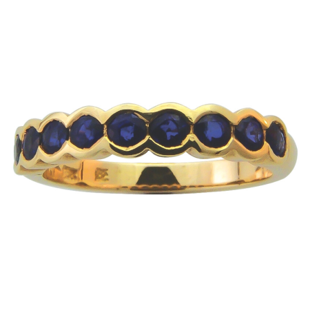 12789 Classic Kaufmann de Suisse 18kt Yellow Gold Half Hoop Eternity Ring featuring 9 Round AAA Bezel Set Blue Sapphires weighing a total of 0.84cts