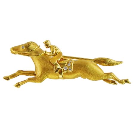 12980 Horse & Jockey Pin Designed and Handmade by Kaufmann de Suisse in 18kt Brushed Yellow Gold featuring 6 Brilliant Cut FVVS Quality Diamonds weighing a total of 0.05cts