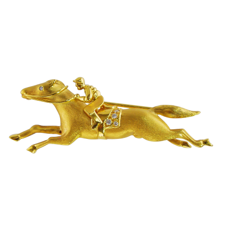12980 Horse & Jockey Pin Designed and Handmade by Kaufmann de Suisse in 18kt Brushed Yellow Gold featuring 6 Brilliant Cut FVVS Quality Diamonds weighing a total of 0.05cts