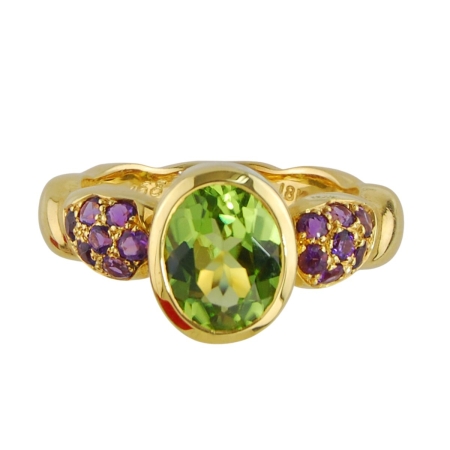 16879 Single Flowing Lines Peridot & Amethyst Ring Designed & Handmade by Kaufmann de Suisse in 18kt Yellow Gold featuring on Oval Peridot weighing 2.10cts mounted with 14 Round Brilliant Cut Amet