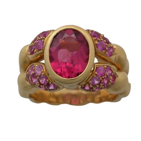 16916 Double Flowing Line Pink Tourmaline and Pink Sapphire Ring Designed & Handmade by Kaufmann de Suisse in 18kt Yellow Gold featuring 1 oval Pink Tourmaline weighing 1.76cts mounted with 32 Rou