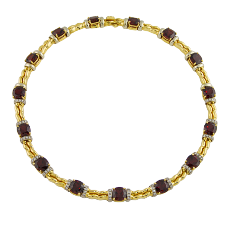 17532 Rhodolite Garnet & Diamond Necklace Designed & Handmade by Kaufmann de Suisse in 18kt White and Yellow Gold featuring 15 Cushion Cut Rhodolite Garnets weighing a total of 58.94cts and 64 Rou