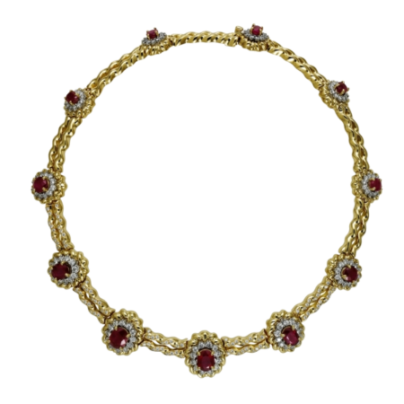 17596 Flowing Lines Burma Ruby & Diamond Necklace Designed & Handmade by Kaufmann de Suisse in 18kt Yellow Gold & Platinum featuring 11 Burma Rubies weighing 18.09cts and 222 Round Brilliant Cut F