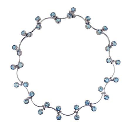 19673 One of a Kind Flowing Lines Wave Necklace Designed & Handmade by Kaufmann de Suisse in 18kt White Gold featuring 36 Round Brilliant Cut Sky Blue Topaz weighing a total of 34.15cts and 24 Rou