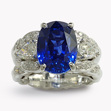 21546 Double flowing lines sapphire ring with pear diamonds