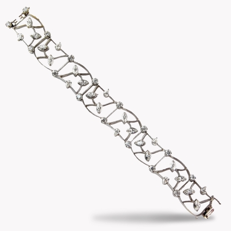 22055 Diamond Constellation Link Bracelet Designed & Handmade by Kaufmann de Suisse in 18kt White Gold featuring 40 Mixed Shape G VS Quality Diamonds weighing a total of 7.68cts