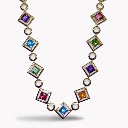 23446 One of a Kind Multi Color 30 Inch Necklace Designed & Handmade by Kaufmann de Suisse in 18kt Yellow Gold featuring 5 Square Emerald cut Swiss Blue Topaz weighing a total of 25.50cts, 4 Squar