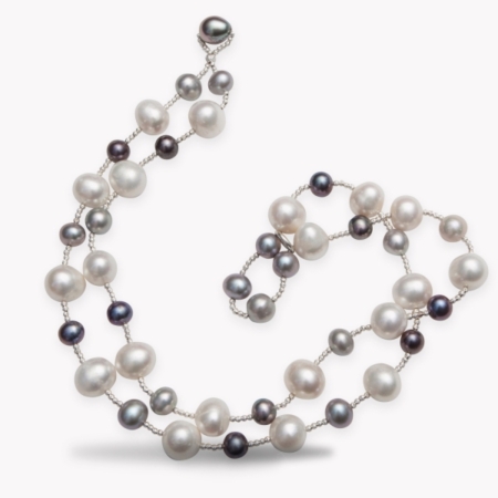 23580 35 Inch Tahitian & South Sea Pearl Necklace Designed & Handmade by Kaufmann de Suisse featuring 32 Baroque South Sea Pearls measuring from 8 to 12mm knotted with 150 Diamond cut 14kt White G